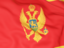 Montenegro. Flag background. Download icon.