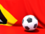 Восточный Тимор. Футбольный мяч на фоне флага. Скачать иконку.