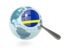 Curacao. Magnified flag with blue globe. Download icon.