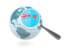 Fiji. Magnified flag with blue globe. Download icon.