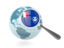 Французские Южные и Антарктические территории. Флаг под увеличительным стеклом с голубым глобусом. Скачать иллюстрацию.