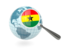 Гана. Флаг под увеличительным стеклом с голубым глобусом. Скачать иллюстрацию.