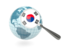 Южная Корея. Флаг под увеличительным стеклом с голубым глобусом. Скачать иллюстрацию.