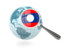 Laos. Magnified flag with blue globe. Download icon.