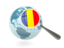 Romania. Magnified flag with blue globe. Download icon.