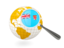 Fiji. Magnified flag with globe. Download icon.