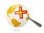 Guernsey. Magnified flag with globe. Download icon.