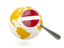 Latvia. Magnified flag with globe. Download icon.