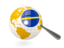 Nauru. Magnified flag with globe. Download icon.