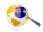 Turks and Caicos Islands. Magnified flag with globe. Download icon.