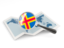 Aland Islands. Magnified flag with map. Download icon.