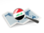 Республика Ирак. Флаг под увеличительным стеклом над картой. Скачать иллюстрацию.