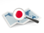 Japan. Magnified flag with map. Download icon.
