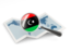 Libya. Magnified flag with map. Download icon.