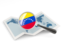 Venezuela. Magnified flag with map. Download icon.